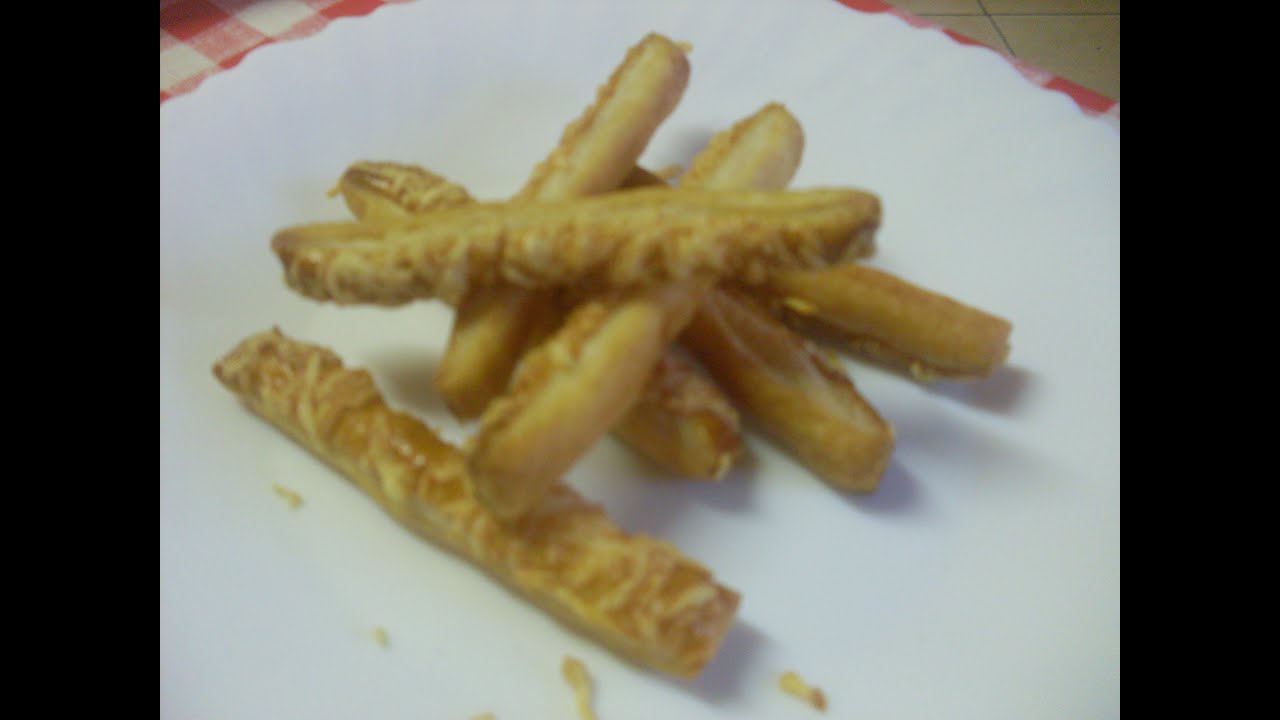 Comment faire des allumettes feuilletées au fromage rapé?