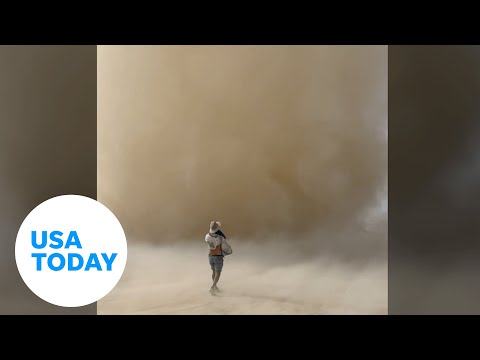 Man runs through massive dust devil at Burning Man Festival in Nevada | USA TODAY