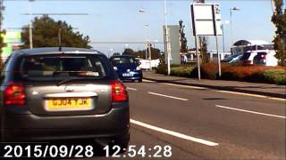 Driver pulls out in front of another at roundabout