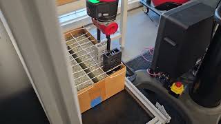 Sawyer Robot Loading Raspberry Pi Cases into an ESS Test Fixture