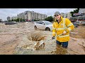 Unclog Flooded Street Drain Clearing the Blocked Clog