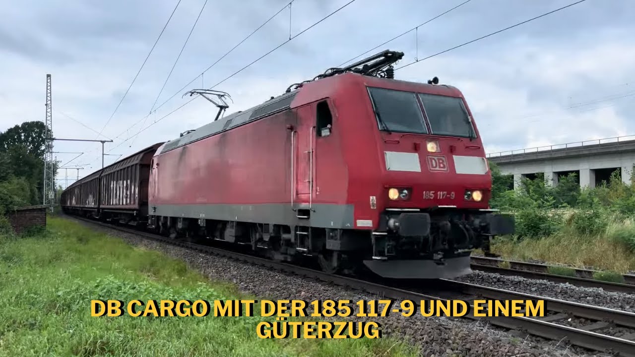 DB Cargo with the 185 117-9 and a freight train