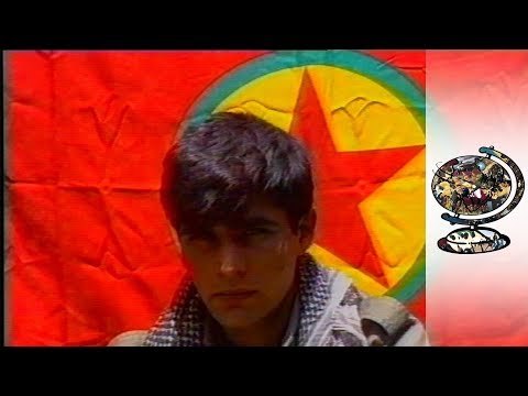 July 1991 The fight for a Kurdish state has been led for over forty years by wealthy landowners. But now a new force has emerged; the PKK, or Kurdish Workers' Party. This film follows the PKK as they move along the mountainous border between Turkish and Iraqi Kurdistan. The border between Turkey and Iraq has been swept away by the UN-declared safe-haven and the PKK are garnering support from Iraqi Kurds. The PKK teach a Maoist philosophy to their recruits and, uniquely among Middle Eastern people, the women study, live and fight along with the men. A film by Mark Stucke. Journeyman Pictures