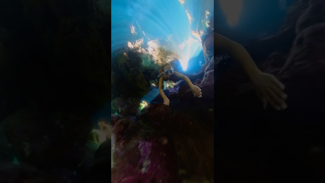 Underwater cave swim with