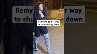 Remy Ma outside promoting her Remy network app