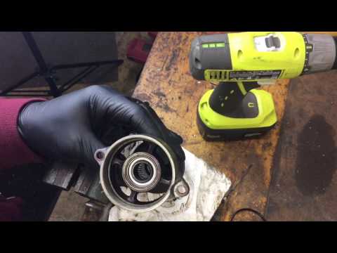 How to install lower unit seals 1977 Evinrude 15HP Outboard Motor Part 6