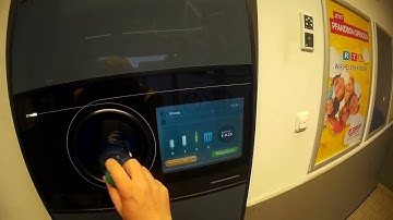 Blind customer using Tomra reverse vending machine at Netto, Berlin, Germany (12.04.2023)