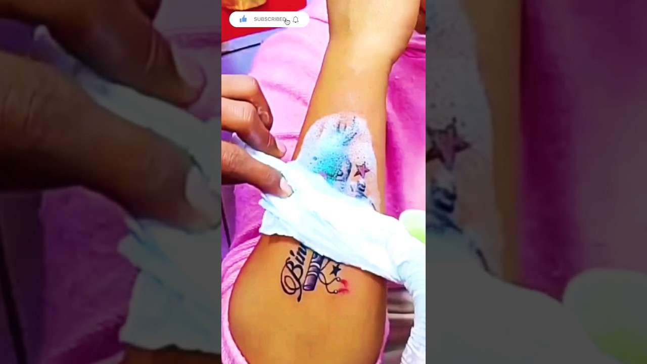 feather tattoo with flute bunny and Pooja 