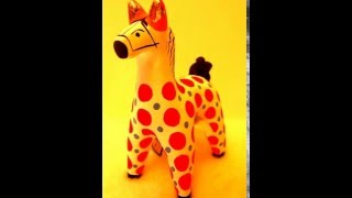 Дымковская игрушка Красный конь