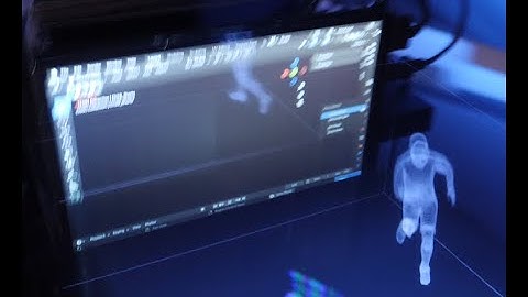 Trans-Dimensional Portal using a Voxon Photonics VX1 Volumetric Display