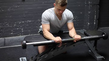Palms Down Barbell Wrist Curls Over A Bench