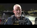 Man hospitalized after being shot in parking lot