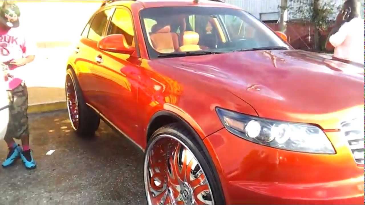 Kandy orange FX35 on 30" Forgiato wheels