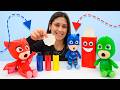 Ayşe ve PJ Masks'ın atölyesi: bozuk paraları biriktiriyor, kumbarayı yapıp süslüyorlar! Çocuk oyunu.
