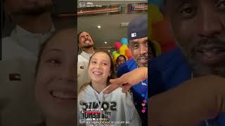 Sean 'Diddy' Combs introducing his alleged adopted white daughter