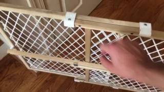 DIY Self Closing Spring Loaded Pet Baby Gate DIY do it yourself home built self closing pet baby gate. This is a super simple cheap under $20 gate.
