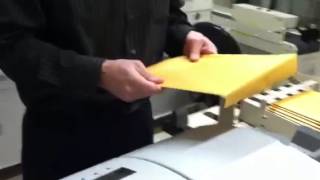 Envelope Sealer with 10x13 envelopes running