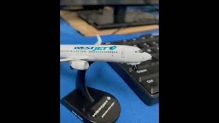 PS5815 1 POSTAGE STAMP WESTJET 737-800 1/300 by Postage Stamp airplanes.