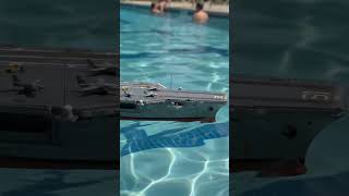 Aircraft Carrier in a Public Swimming Pool
