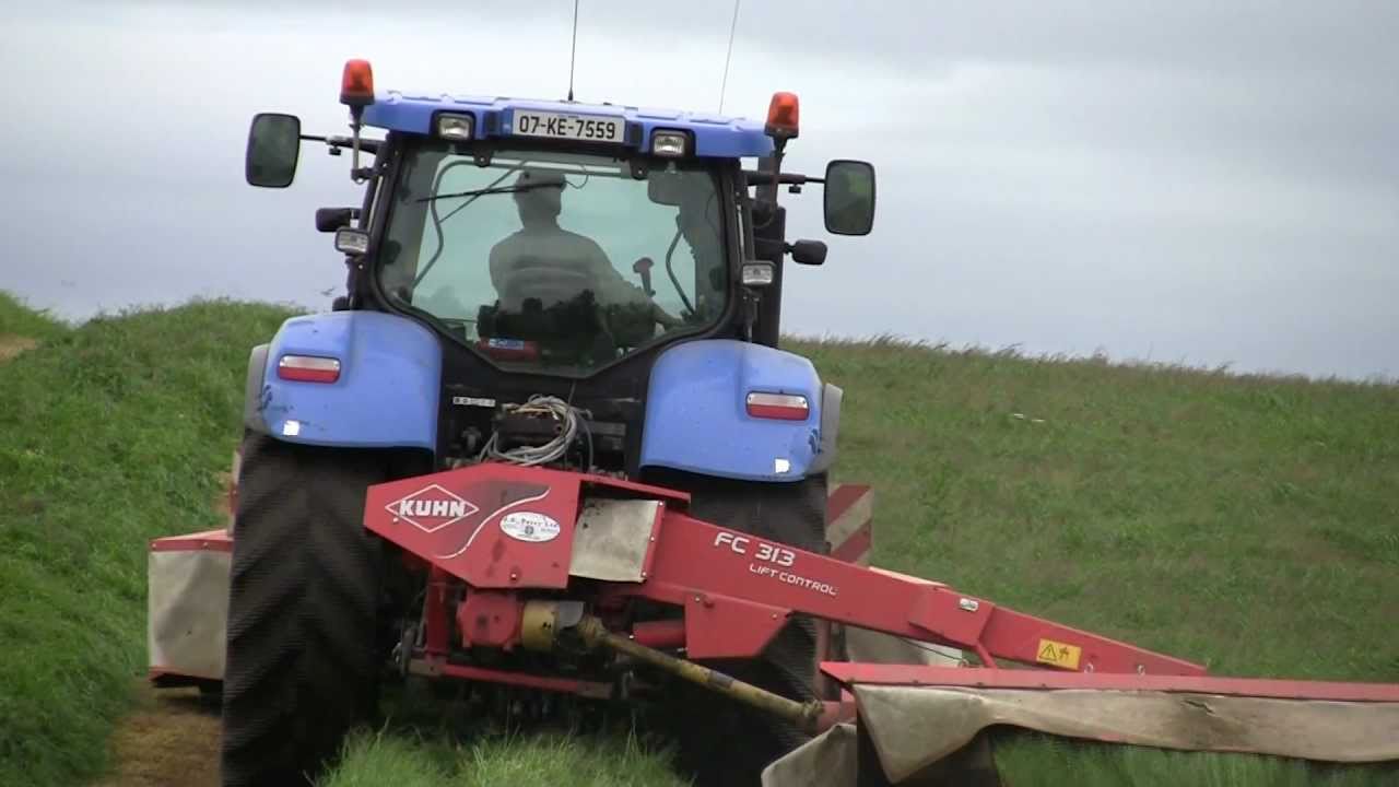 Silage 2011 Roger Perry Mowing Grass with New Holland and Kuhn FC313