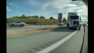 Titanium Transportion truck driver dangerously re-enters highway from off ramp