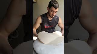 Lebanese guy preparing bread with a Saj - Lebanese bread شاب لبناني يعد الخبز بالصاج - خبز لبناني