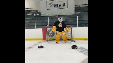 Colin Ronan of Cushing Academy working mogility skating with some textbook glove and blocker saves.