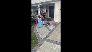 Jumping Halloween Spider Was a Good Happy Scare for Two Girls Trick or Treating