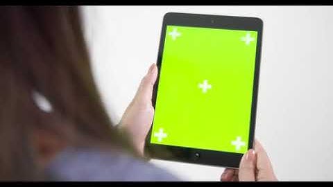 Free Stock Video Footage Lady Lifting Chroma Screen Tablet