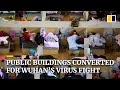 Public buildings converted into medical facilities for coronavirus patients in Chinese city of Wuhan