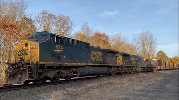 Small CSX M827/27 soars past CP57 with YN2 #81 trailing 3rd
