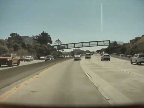 Tesla Cybertruck wheel hubcap flying off on the freeway almost hitting a car. Tesla dashcam footage