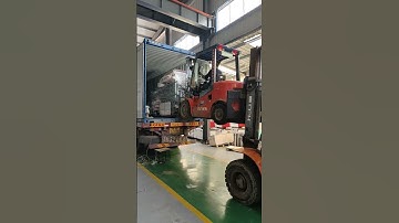 Loading container injection moulding machine