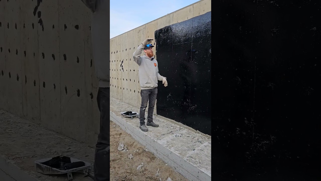 Luke explains the purpose of the black tar on a foundation wall. What should he explain next?