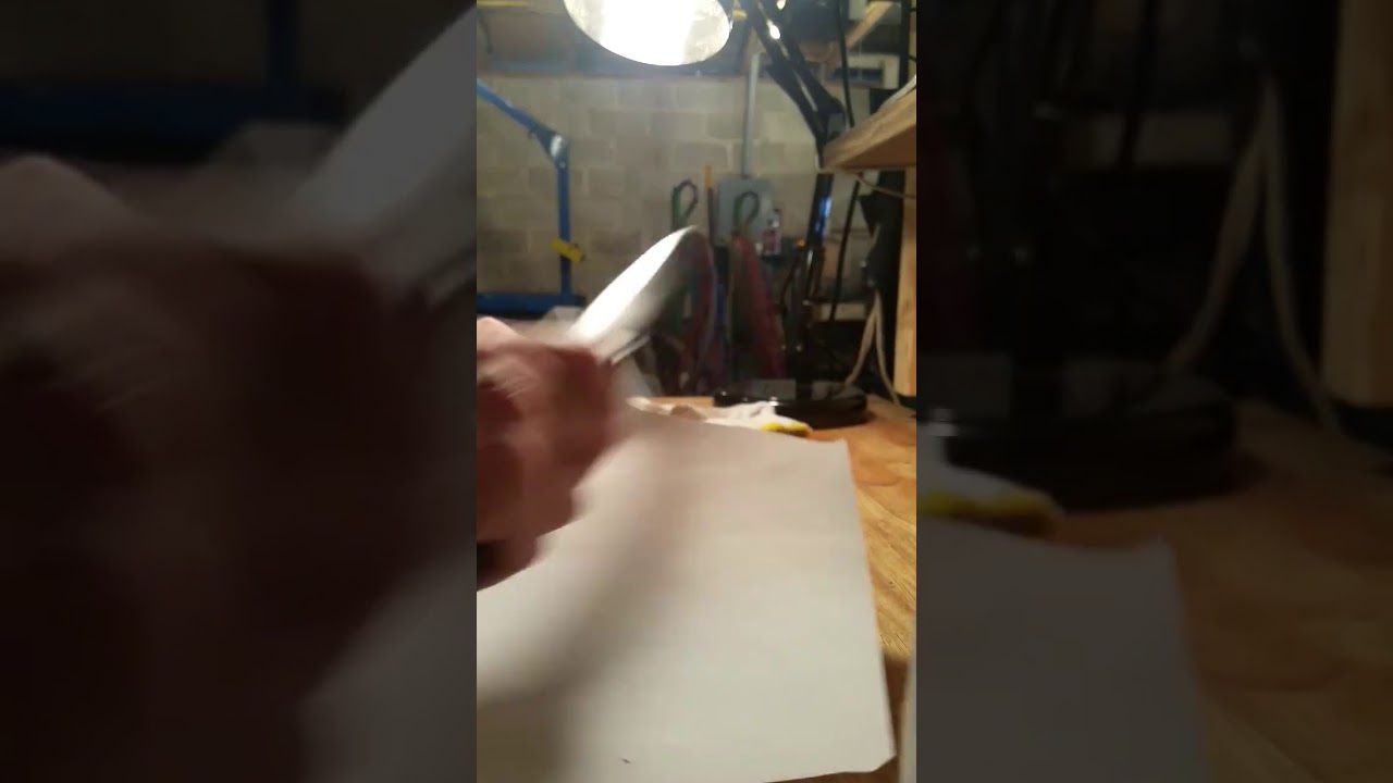 Chisel Ground Dagger Cutting some Heavy Weight Paper