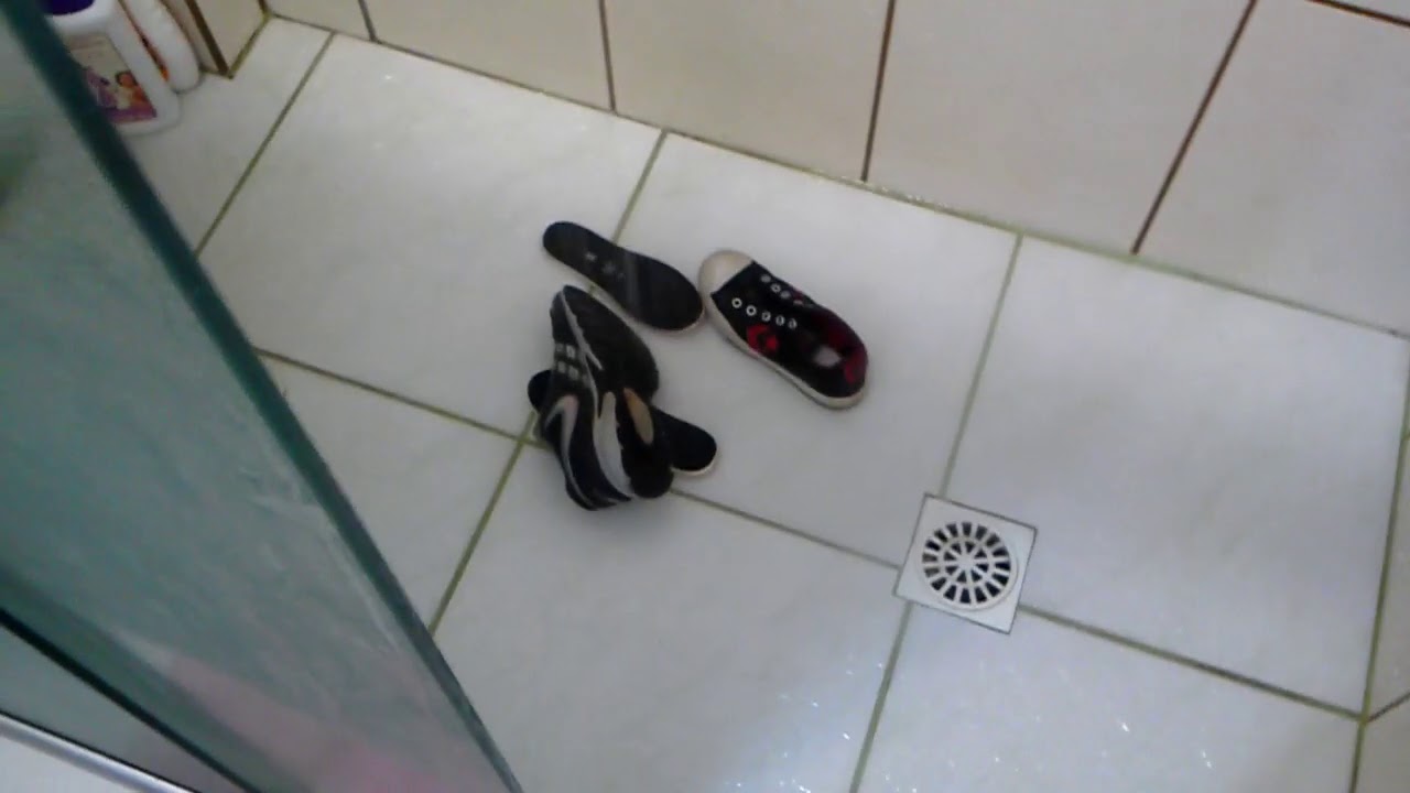 Washing some old sneakers I found in the trash in the shower - YouTube