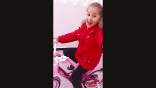 5 YEARS-OLD GIRL RIDES A BIKE