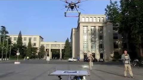 Autonomous Landing a Quadrotor on a Moving 6DOF Platform