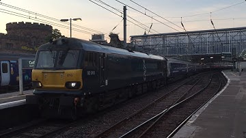 Caledonian sleeper British Rail Class 92 + 16 coaches departing Carlisle