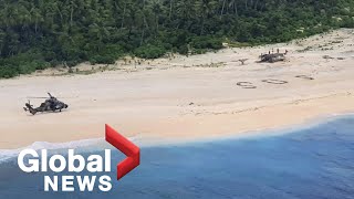 "SOS" message written in the sand saves 3 men stranded on remote Pacific island