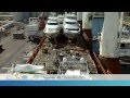 Sevenstar yacht transport discharges yachts from dijksgracht in port everglades
