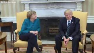 Donald Trump​ appears to ignore requests for a handshake with Angela Merkel​
