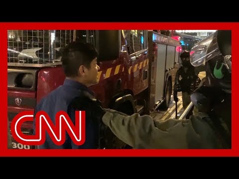 Hong Kong firefighters get caught up in clashes