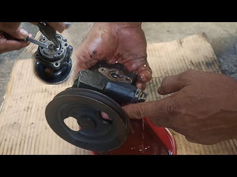 how to replace oilseal steering pump L200 Mitsubishi