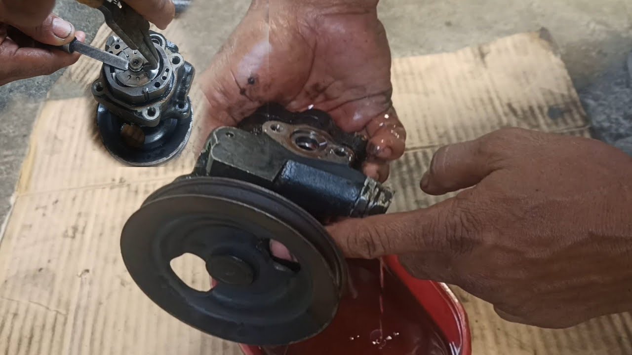 how to replace oilseal steering pump L200 Mitsubishi