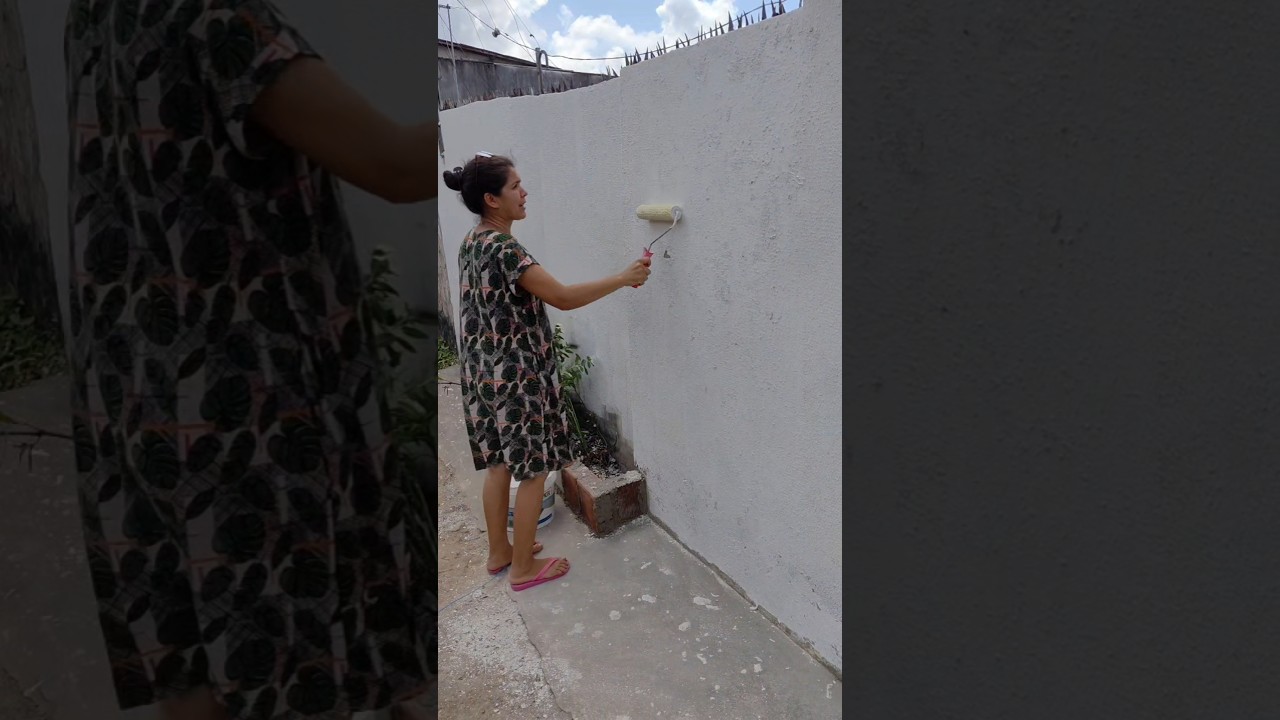 pintamos o muro da cor marfim