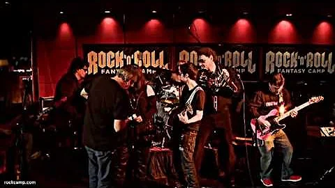 Debbie Bingham playing drums with Falcons of Adren...