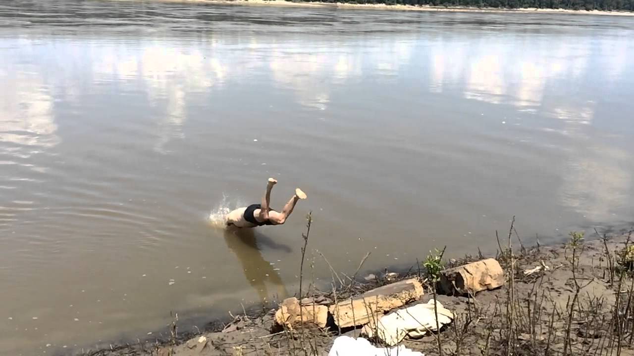 Adam diving into the Mississippi River YouTube