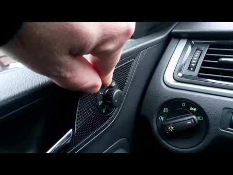 Как включается обогрев боковых зеркал на Skoda Rapid