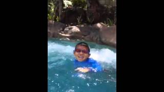 Kids swimming Guam's Hyatt regency